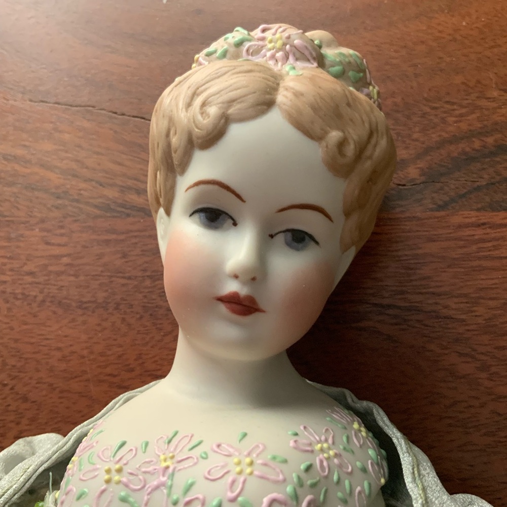 Vintage Porcelain Doll with Floral CHEST unbranded